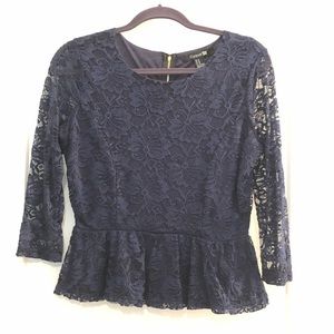 Lace peplum top with zipper back